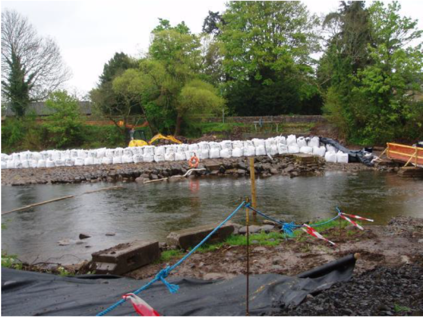 Area of river being worked on isolated from main river downstream