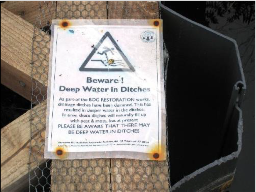 warning sign about deep water in ditches