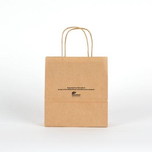 Paper back Poo kits distributed to campers to reduce human waste