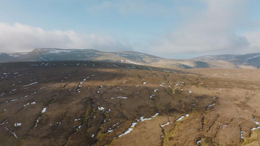 Aerial photograph showing a network of gullies and moorland grips. The remote and exposed site made conditions challenging.