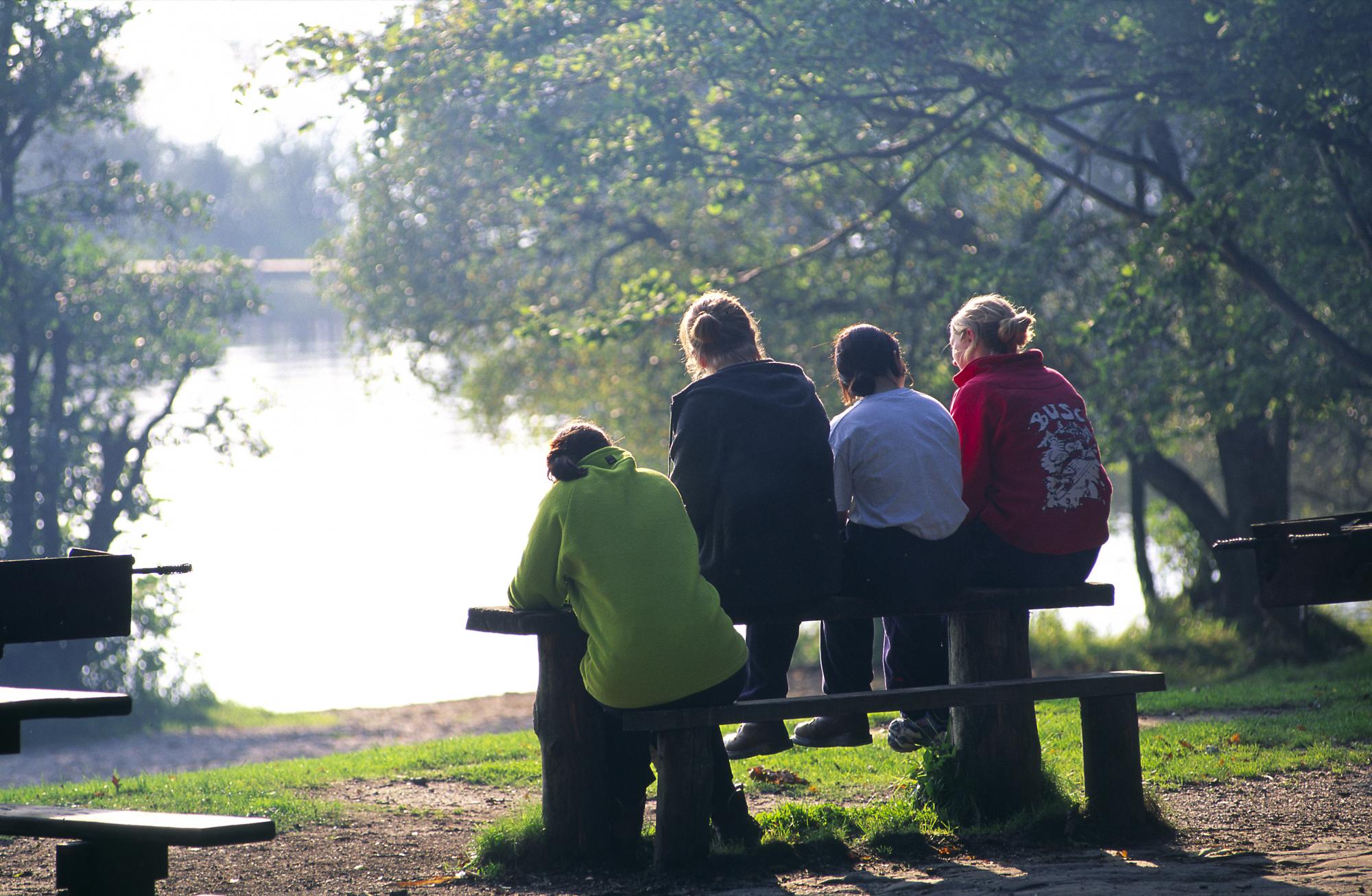 Family enjoying loch-side view