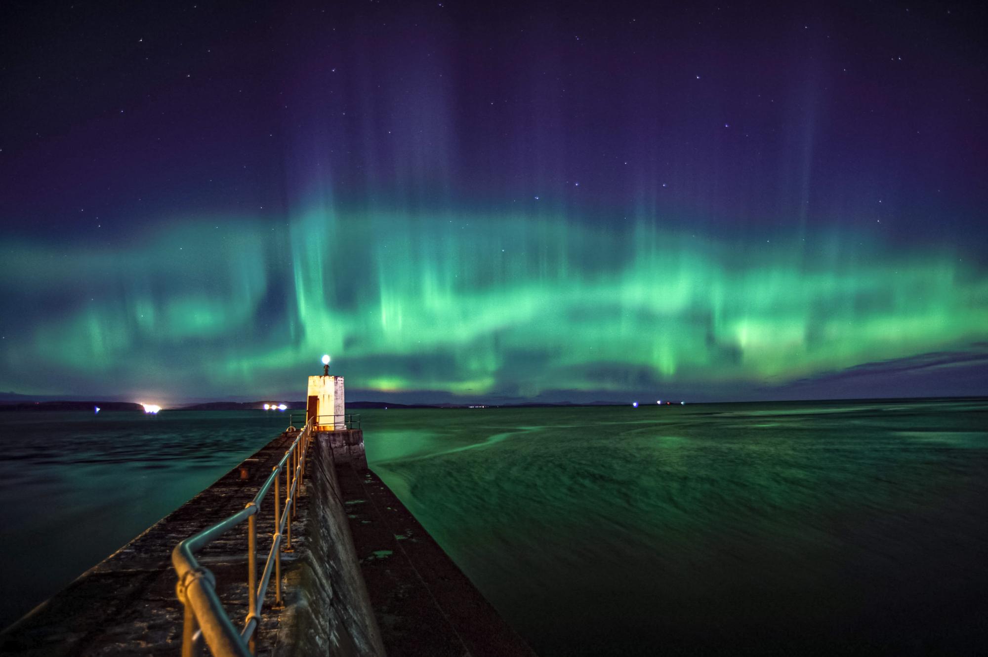 Aurora pills weaving across the sky, Nairn Harbour.